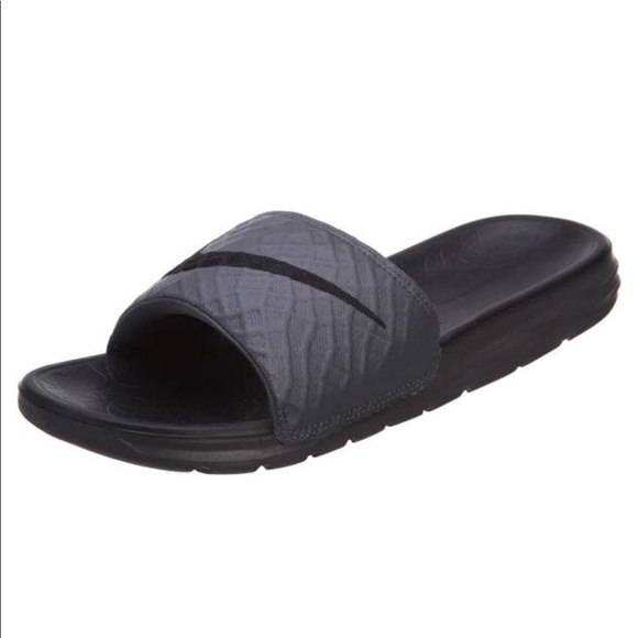 grey and black nike slides